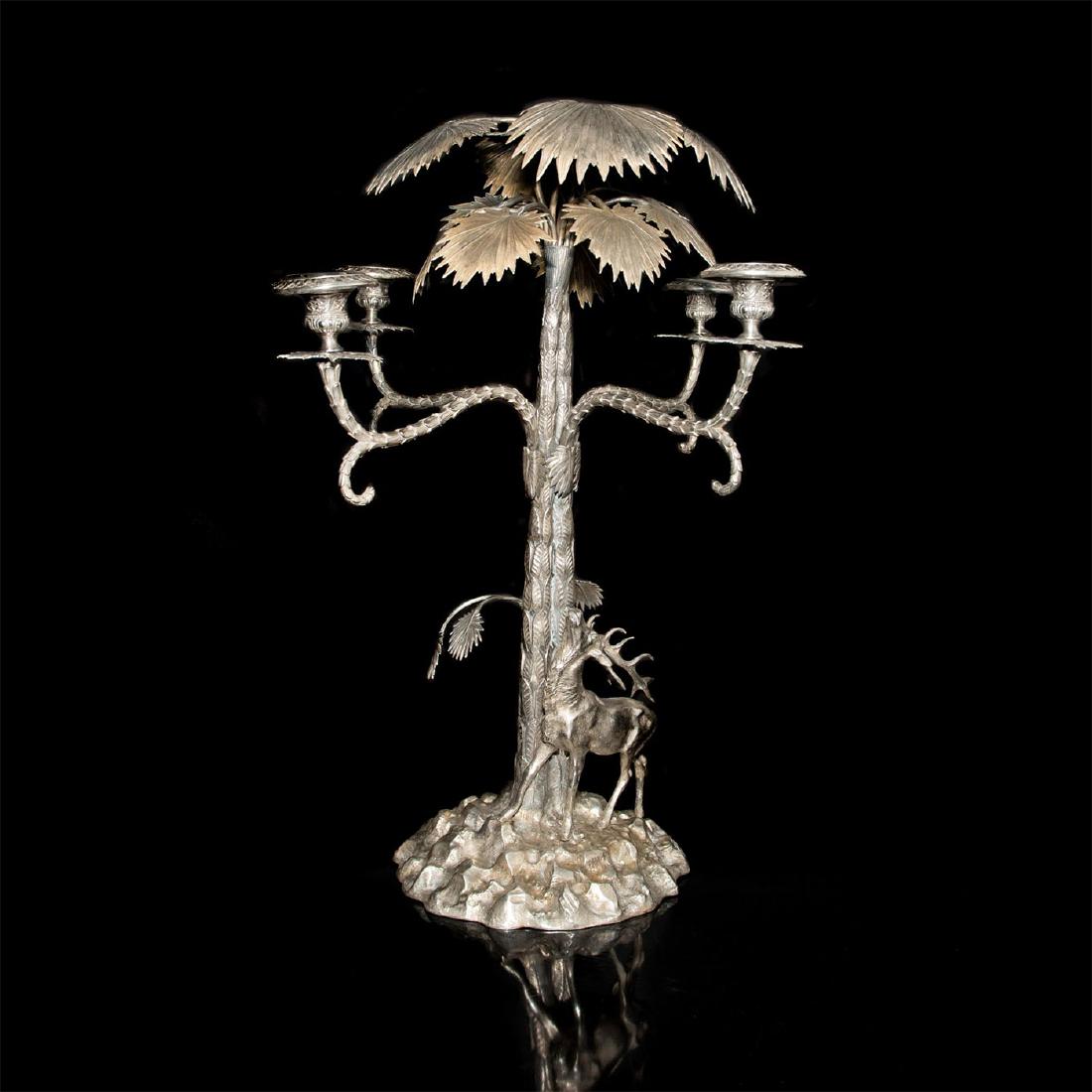 LARGE WMF SILVERED BRONZE SCULPTED CANDLESTICK: Large WMF silvered bronze sculptural candlestick Large WMF silvered bronze sculpture has 4 removable lite holders that branch out beyond center to create candelabra formation. A canopy of realistic pa