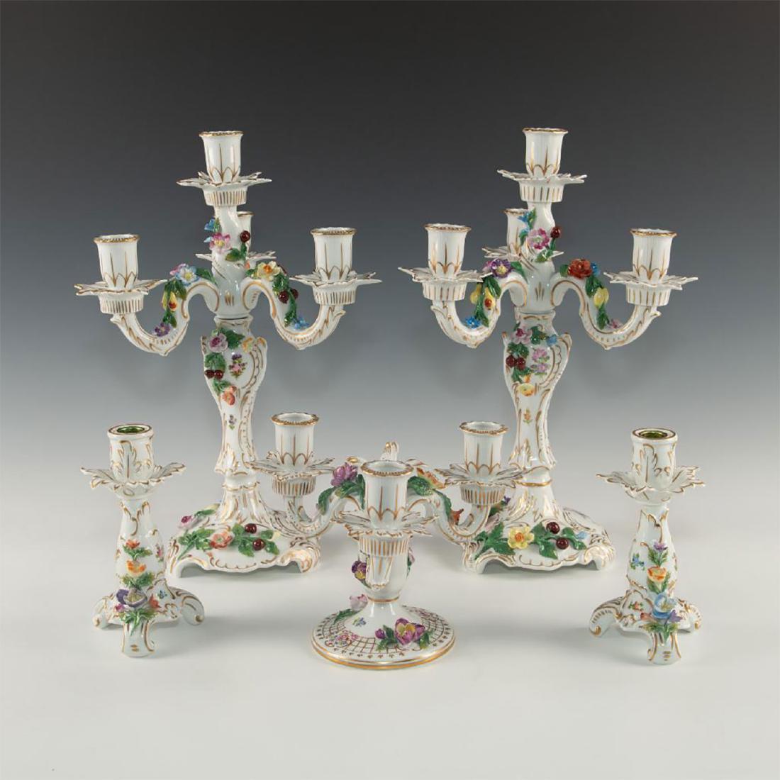 LOT OF FIVE CARL THIEME GERMAN PORCELAIN CANDELABRAS: 2 large 4-light candle holders, 1 medium 3-light & 2 smaller holders with 1-light. Exquisite and delicate floral petals with buds adorn the tapers, hand-painted by the Saxonian Carl Thieme design hous
