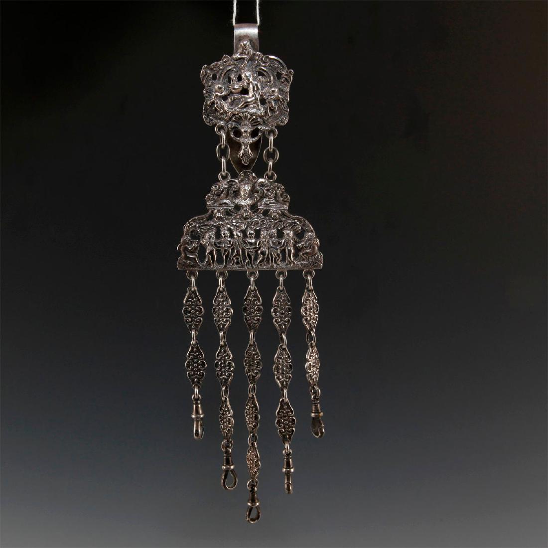 VICTORIAN STERLING SILVER CHATELAINE: Decorative chained and intaglio piece of classic medieval garb- meant to hold keys. Hallmarked Birmingham assay, George Unite silversmith, 1890 date letter, Sterling. Total weight of silver approximat