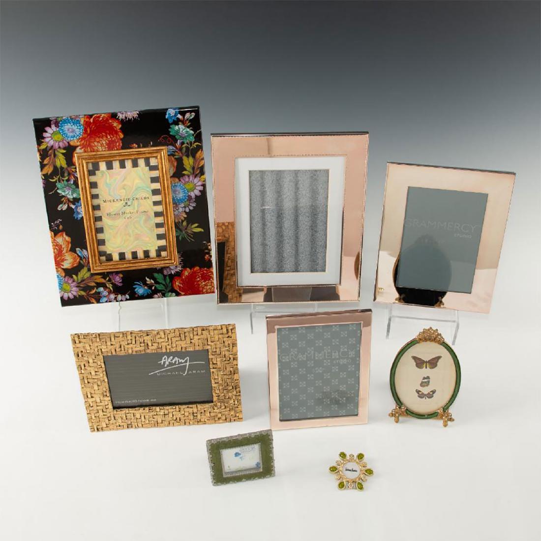 GROUP OF 8 MODERN PICTURE FRAMES MACKENZIE STRONGWATER: Grouping of 8 frames by various artists. Including MacKenzie - Childs "Flower Market" (11"H x 9"W), Martha Stewart Pink Gold tone frame (10.5"H x 8.5"W), Michael Aram Gold Bamboo from Palm Series fram