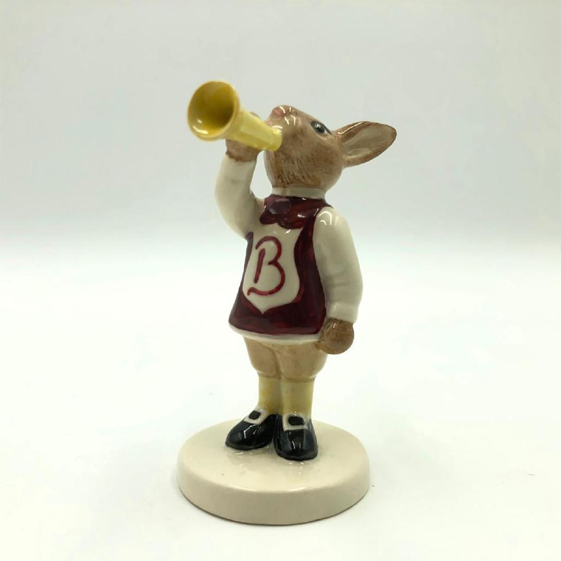 ROYAL DOULTON HARRY THE HERALD BUNNYKINS DB49: First Variation Herald bunny from Royal Family Series. Hand painted white, maroon, tan, yellow with letter B on front of shirt and trumpet. Artist: Harry Sales and David Lyttleton Issued: 1986-1990 Di