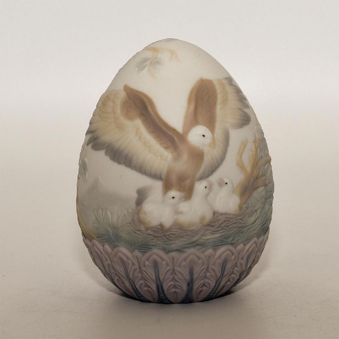 LLADRO FIGURINE 1997 EGG: 1997 egg with eagles - Lladro number 01017552. Huevo De Pascua 97 (with box). Artist: Design & Decoration Dept. Issued: 1994 Dimensions: 5.07"H Manufacturer: Lladro Country of Origin: Spain
