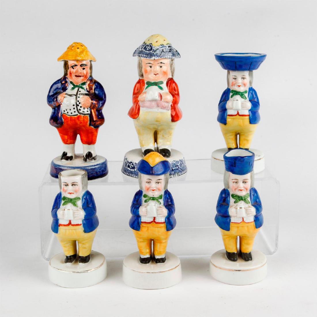 GROUP OF SIX ANTIQUE PORCELAIN SALT, PEPPER, CONDIMENTS: 4 grouped, figural painted condiments with Chelsea marks. 2 unmarked piece of similar ilk. Chelsea pieces have gold overglaze anchor. Dimensions: 5.5"H, tallest Manufacturer: Chelsea, other Country of