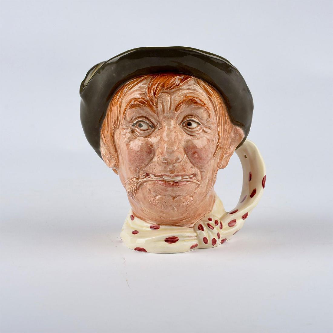 ROYAL DOULTON JARGE LARGE CHARACTER JUG: Doulton's Farm and Country series. Jarge wears a green hat and a white scarf designed with red polka dots. Artist: Harry Fenton Issued: 1950 Dimensions: 6.5"H Manufacturer: Royal Doulton Country of Or