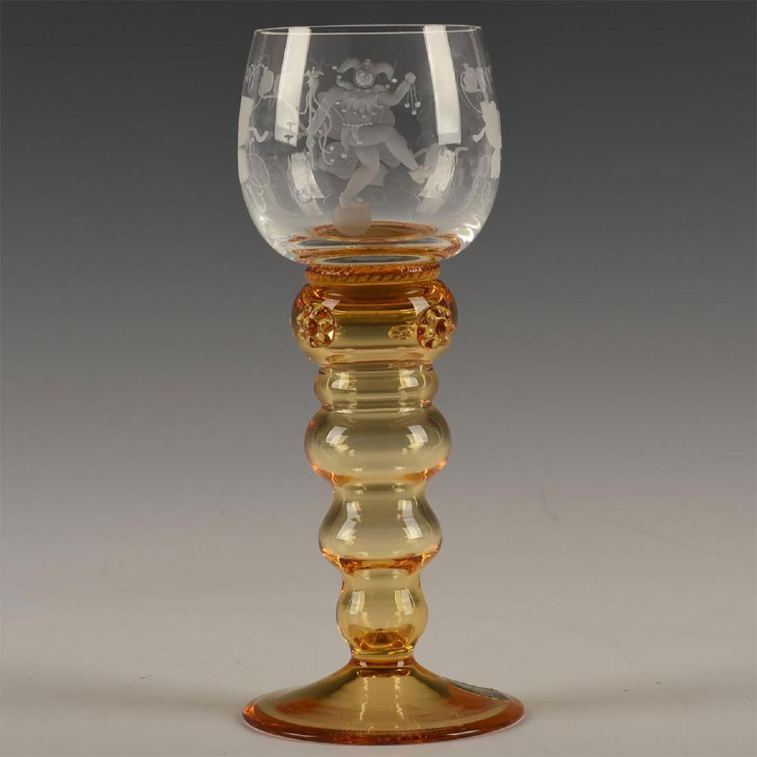 GERMAN THERESIENTHAL ETCHED AMBER WINE & CORDIAL: Amber hue fish bowl shape, etched with stepped tiered knop hollow stem and footed flared base. Mouth blown molded glass and hollow stem. Repeating pattern etched design on bowl of grape leaves and clu