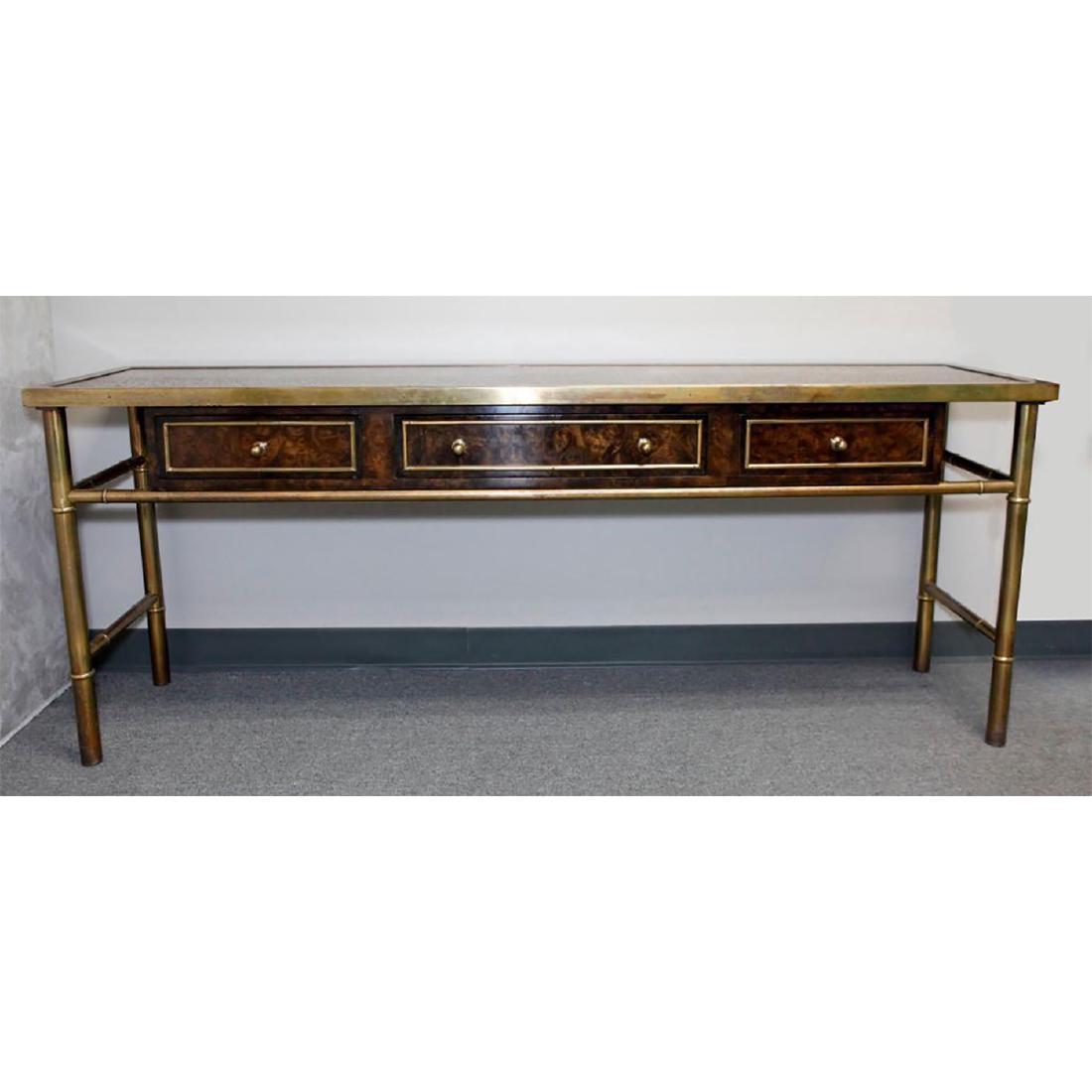 MASTERCRAFT CONTEMPORARY AMERICAN CONSOLE TABLE: Mastercraft Furniture Company, Grand Rapids, Michigan. The rectangular recess textured panel top, above rounded piping framed short burled walnut drawers flanking one long burled walnut drawer centeri