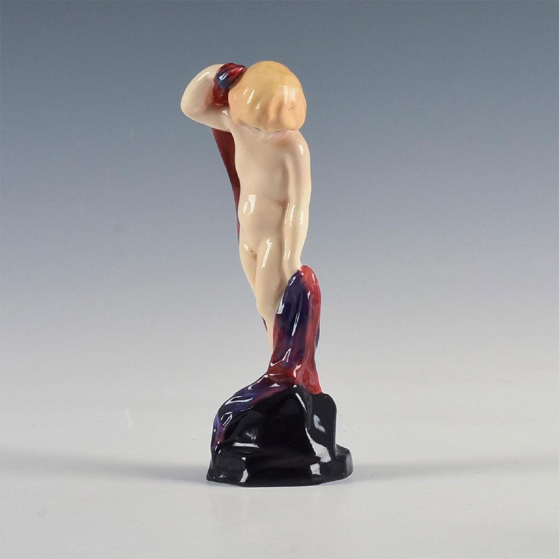 ROYAL DOULTON ART DECO FIGURINE, SEA SPRITE HN1261: Semi-nude in rare lustre of cream, orange, yellow, purple, red. A semi-nude study in a rare lustre of cream, orange, yellow, purple and red. A young girl standing on a stylized rock, her pose suggesti