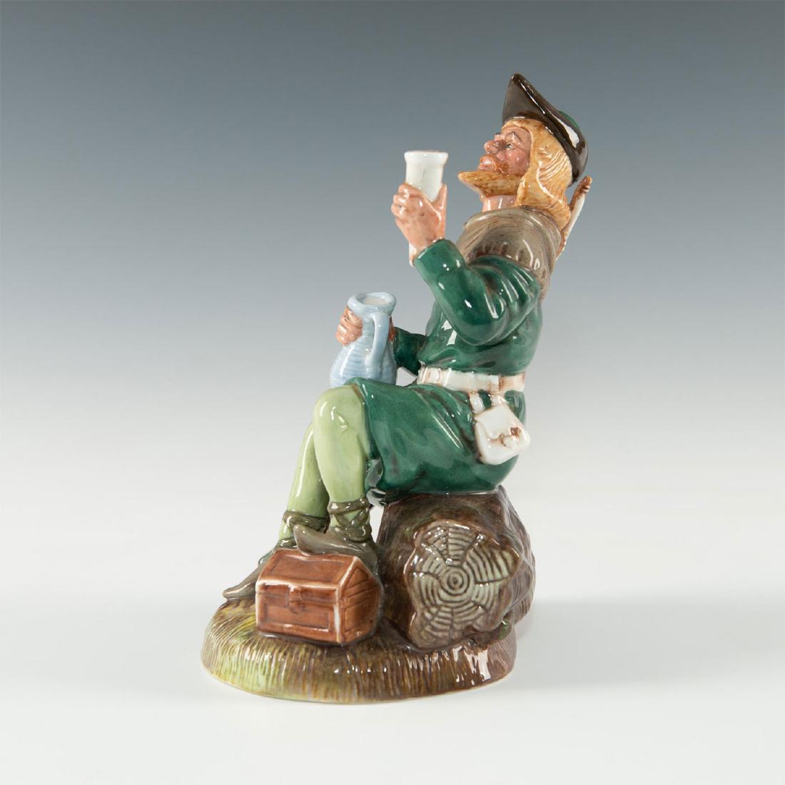 ROYAL DOULTON FIGURINE, ROBIN HOOD HN2773: Modeled as the English folk hero, seated with flagon and horn. The first reference to Robin Hood appeared in the 14th century. The legendary hero of English folklore and subsequent literature and film
