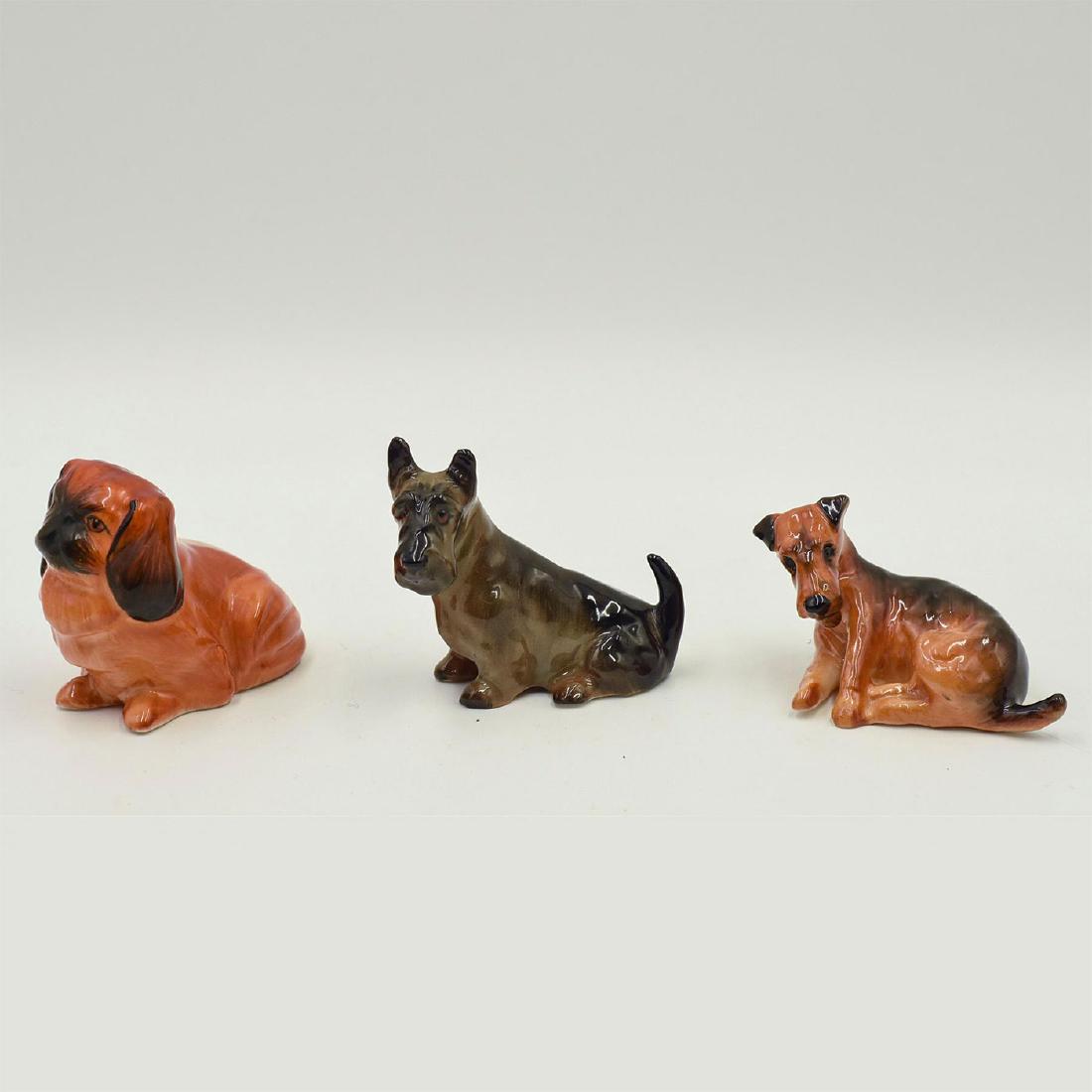 TRIO OF ROYAL DOULTON ANIMAL FIGURINES, K SERIES DOGS: Includes Pekingese, Scottish Terrier and Fox Terrier. Dimensions: 2"H-tallest Edition Number: K6, K18, K5 Manufacturer: Royal Doulton Country of Origin: England