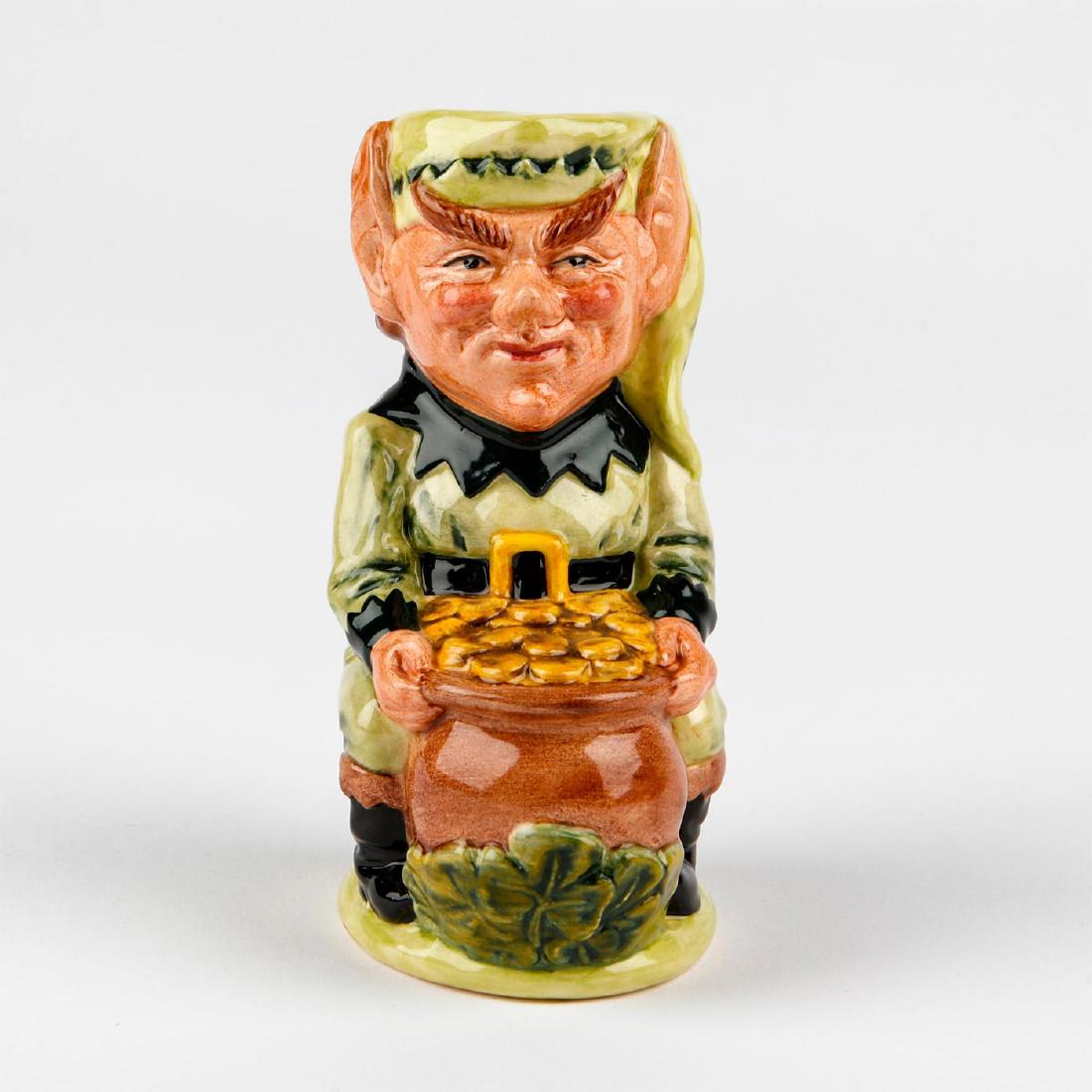 ROYAL DOULTON TOBY JUG, LEPRECHAUN D6948: Leprechaun in light and dark green with a pot of gold. Royal Doulton backstamp. Artist: Stanley J. Taylor Issued: 1994 Dimensions: 5"H Edition Number: 232 Edition Size: 2500 Manufacturer: R