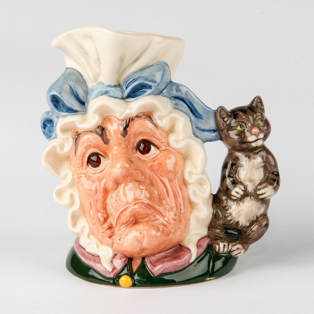 ROYAL DOULTON LARGE CHARACTER JUG, COOK & CHESHIRE CAT: D6842; Characters from "Alice's Adventures in Wonderland". Royal Doulton large character jug The Cook and The Cheshire Cat. Royal Doulton backstamp. Artist: William K. Harper Issued: 1990-1991 Dimensi