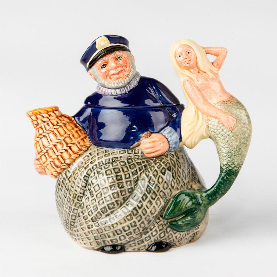 ROYAL DOULTON LARGE CHARACTER TEAPOT OLD SALT D6818: Handle in form of a Mermaid and spout in form of a lobster pot. Royal Doulton backstamp. Artist: Gary Sharpe Issued: 1989 Dimensions: 6.25"H Manufacturer: Royal Doulton Country of Origin: England