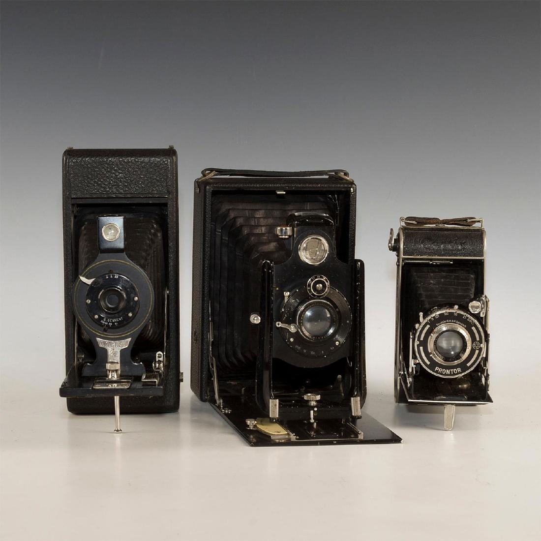 TRIO OF MEDIUM AND LARGE FORMAT FOLDING CAMERAS (1 of 8)