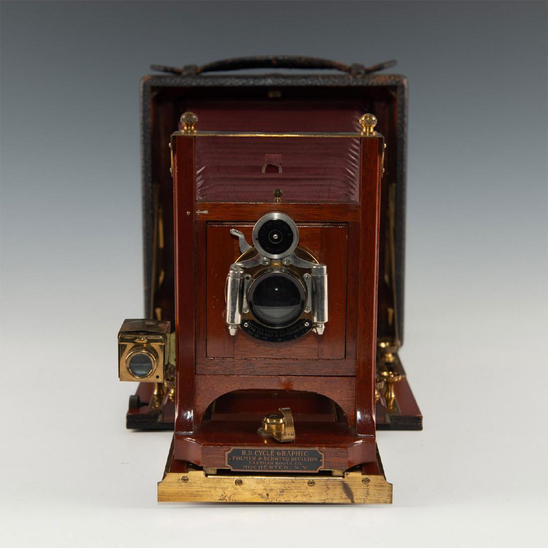 ANTIQUE EASTMAN KODAK R.B. CYCLE GRAPHIC BELLOWS CAMERA: Maroon triple length leather bellows, pebble grain leather case. An original R.B. Cycle Graphic camera made by the Folmer & Schwing Division of Eastman Kodak Company ca. 1907. The maroon leather bello