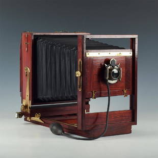 EARLY 20TH C. SENECA PLATE BELLOWS CAMERA: Large mahogany/brass 5"x7" plate; with focal glass, bulb remote. Splendidly furnished plate or view-camera, manufactured by Seneca Camera Co. in Rochester, NY during the first decade of the 20th