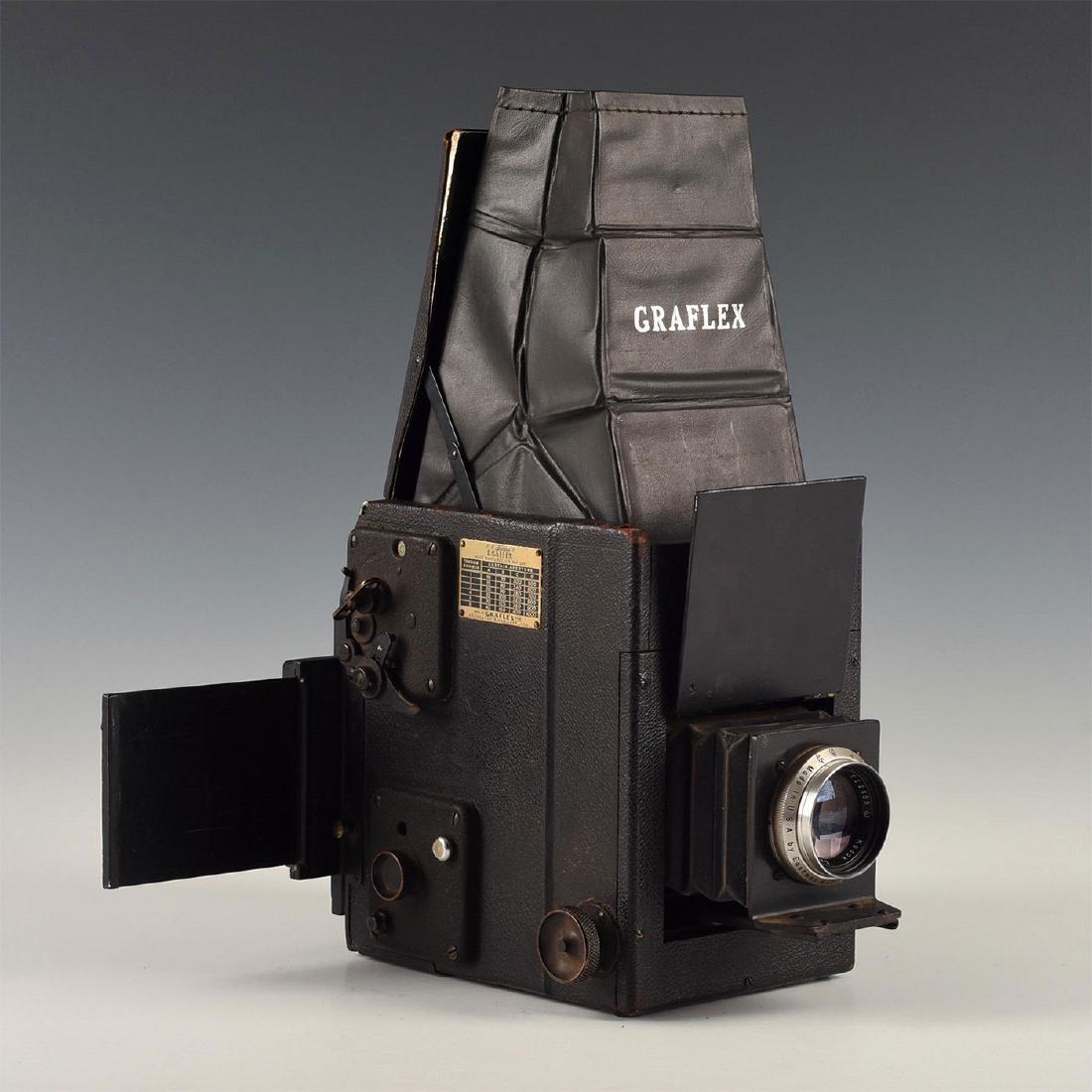 SMALL GRAFLEX R.B. SERIES B FOLDING SHEET FILM CAMERA: Medium format with film pack adapter, retracting lens, leathered. Graflex was synonymous with large format, highly capable, and very portable- for their time- press and battlefield cameras in the firs