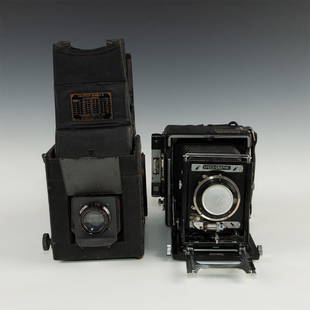 PAIR OF ANTIQUE PRESS CAMERAS BY GRAFLEX: Speed Graphic Model 2A with Zeiss shutter and lens, and Graflex Series B. Graflex was synonymous with large format, highly capable, and very portable- for their time- press and battlefield cameras in