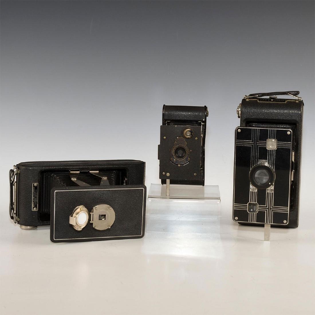 2 KODAK FORWARD FOLDING CAMERAS, 1 16MM ENLARGER: Vest Pocket, Jiffy 6-16, rare enlarger w. 16mm adapter. Two antique cameras featuring a clever central folding action, and one enlarger based off Jiffy model, with its lens replaced by a motion pictur