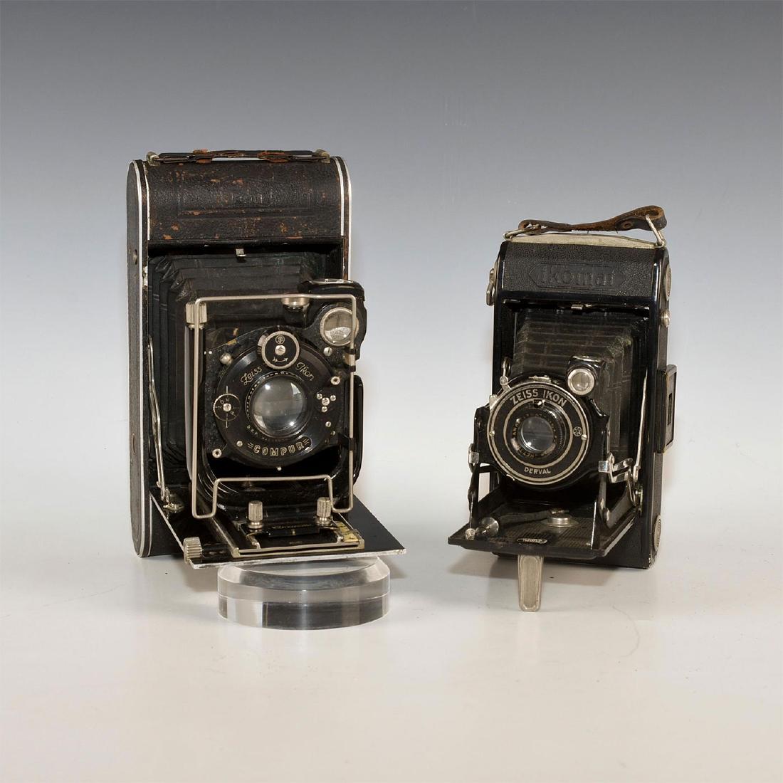 PAIR OF 2 MEDIUM FORMAT ZEISS IKON FOLDING CAMERAS: Handsome pair of deco-inspired antique German roll film cameras. One is the Zeiss Ikon Ikomat (1920s-1930s) with Anastigmat 105mm and Zeiss Ikon Derval shutter; the second is Zeiss Ikon Cocarette Nett