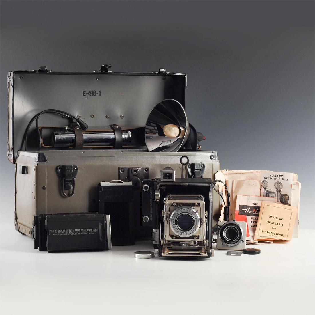 RETRO GRAFLEX PRESS CAMERA KIT IN HARDCASE WITH EXTRAS: Speed Graphic camera, flash system, extra shutter, film holders. Graflex was synonymous with large format, highly capable, and very portable- for their time- press and battlefield cameras in the first