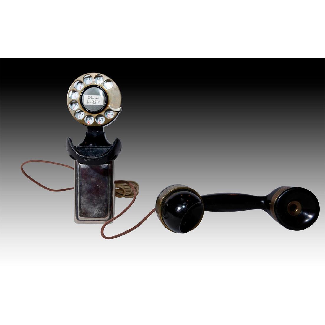AMERICAN ELECTRIC SPACESAVER ROTARY COMPACT PHONE: Black chrome metal rotary dial compact phone, Bakelite receiver. An antique black and chrome metal rotary dial Spacesaver compact phone manufactured ca. 1945 by American Electric Telephone Company wit