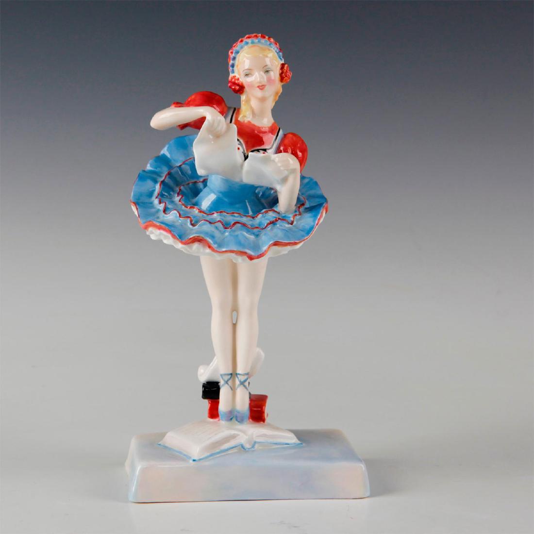 ROYAL DOULTON FIGURINE,COPPELIA HN2115: Figure of a ballerina dressed in blue,red and white. Royal Doulton backstamp. Artist: M. Davies Issued: 1953-1959 Dimensions: 7.5"H Manufacturer: Royal Doulton Country of Origin: England