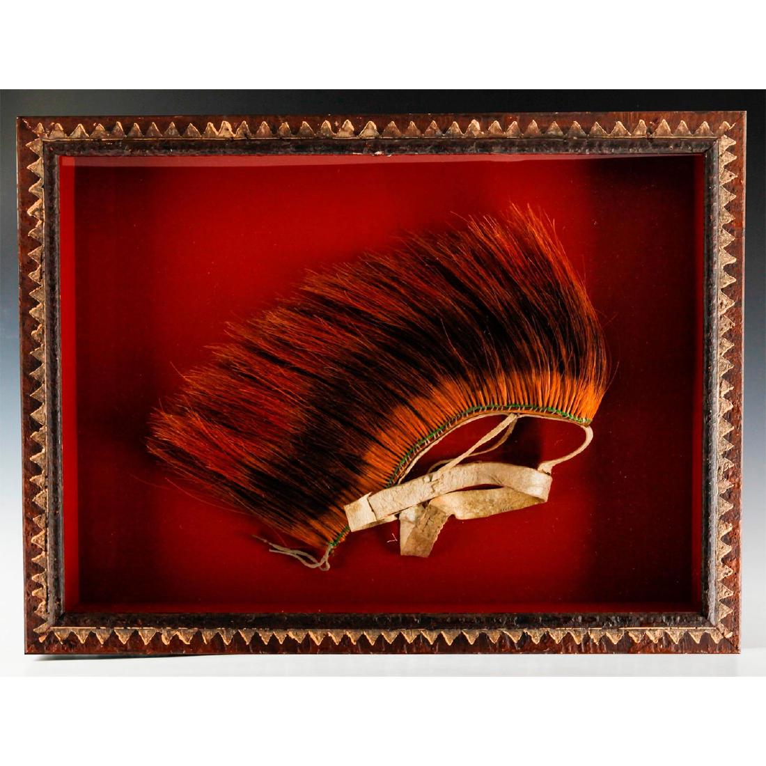 NATIVE AMERICAN TRIBAL HEADDRESS ROACH, LARGE BOX FRAME: Porcupine hair roach, traditional Native American male headdress. Early 20th century Native American apparel artifact with hand colored tail hair from porcupine; red coloration can signify a veteran o