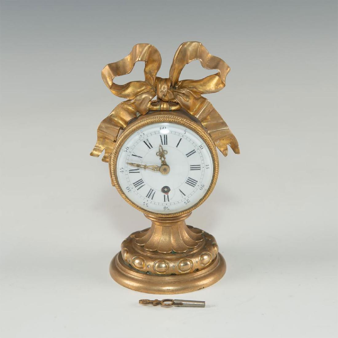 MID-19TH CENTURY SMALL BRONZE MANTLE CLOCK (1 of 4)