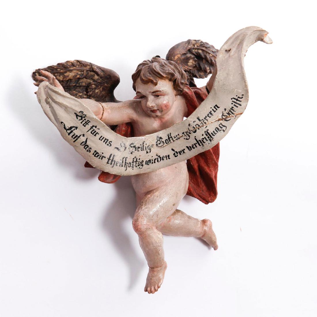 18TH CENTURY POLYCHROME BAROQUE WOODEN ANGEL: Italian German. Hand carved with words from the ANGELUS prayer written in German. Issued: c. 1780 Dimensions: 10"H Country of Origin: South Tyrol