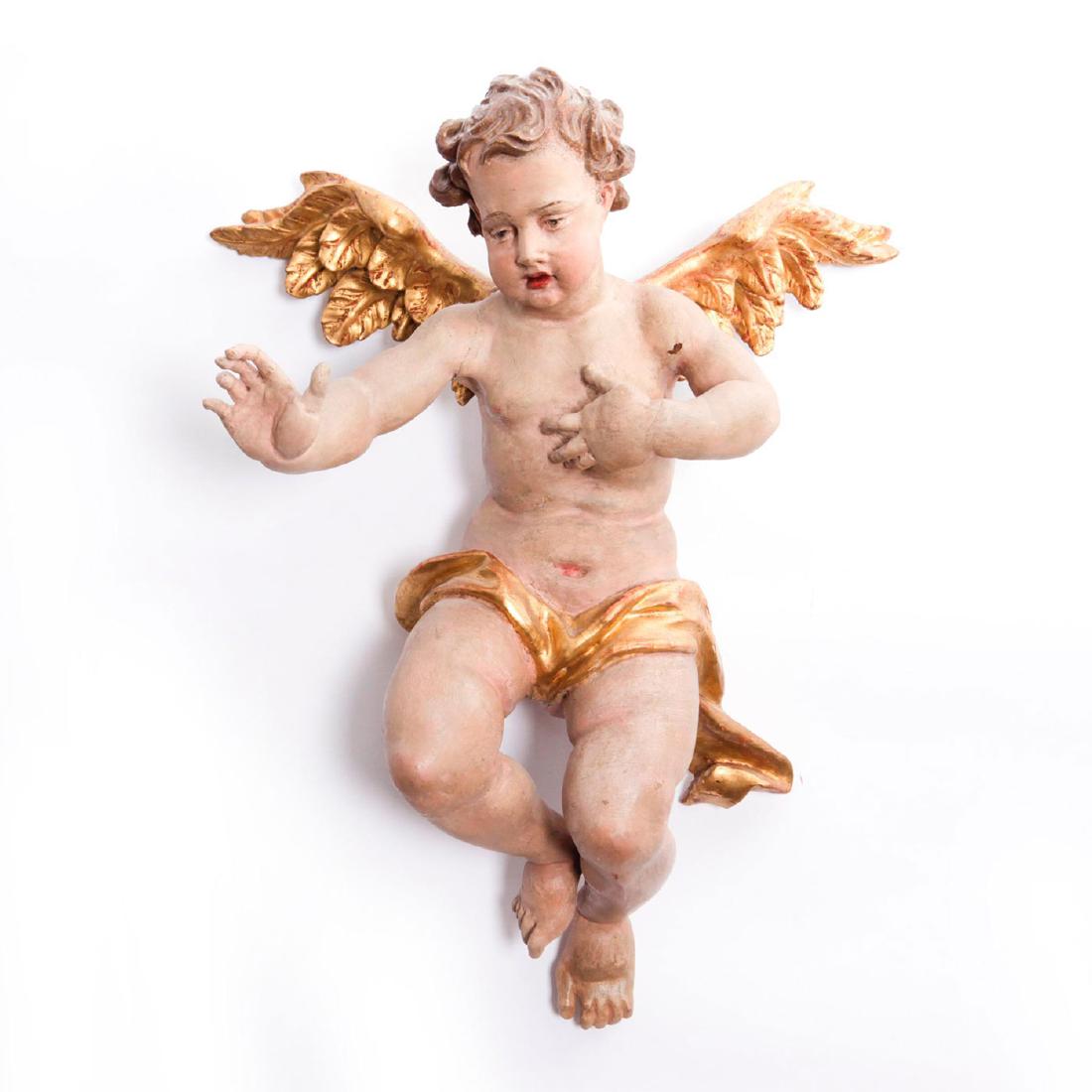18TH CENTURY POLYCHROME BAROQUE WOODEN ANGEL: Italian German. Allegorical. Hand to heart. Hand carved, gold and other colors. Issued: c. 1750 Dimensions: 21"H Country of Origin: South Tyrol
