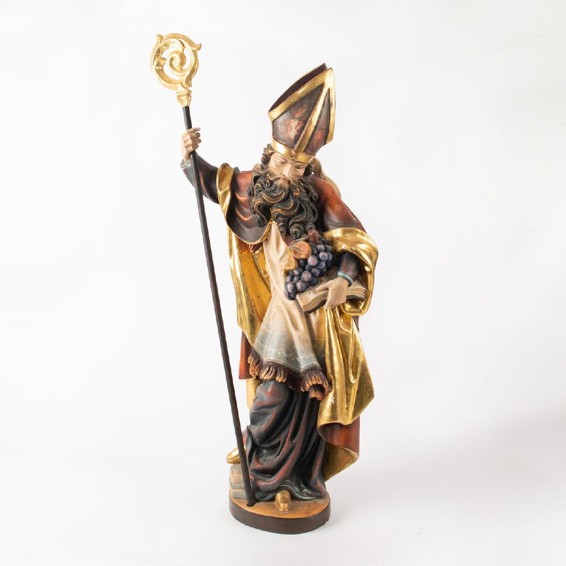 ART NOUVEAU WOODEN SAINT WITH GRAPES AND BIBLE: Italian German. Hand carved, gold, bronze, and other colors. Possibly modeled as St. Urban I, who is depicted in stained glass and church art wearing the Papal Tiara and holding a Bible and grapes. Is