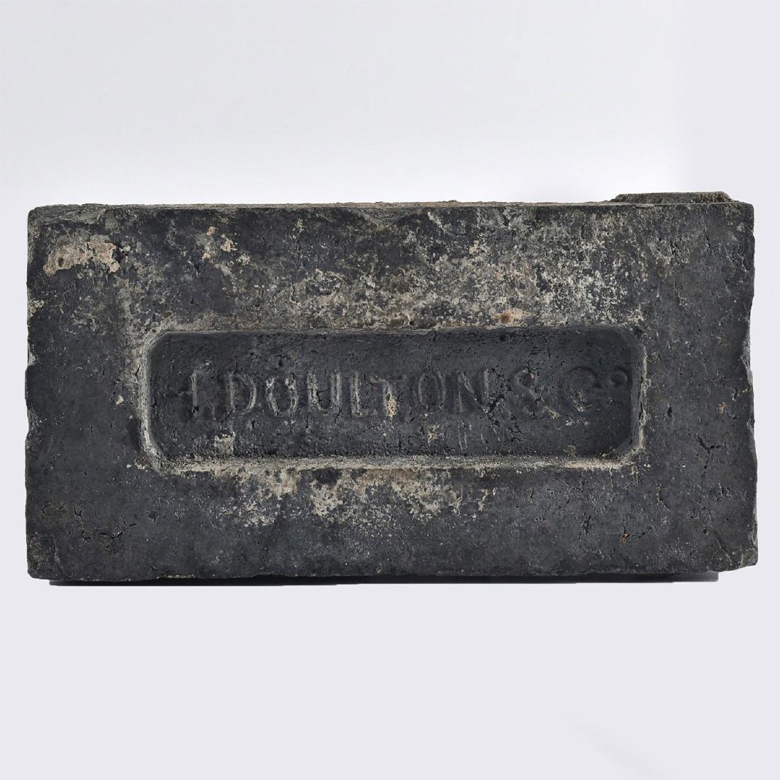 DOULTON AND CO. INDUSTRIAL ARTIFACT, BRICK: Age patinated; Impressed DOULTON & CO. Issued: 19th c. Dimensions: 10"L x 5"W x 2"D Manufacturer: Doulton Lambeth Country of Origin: England
