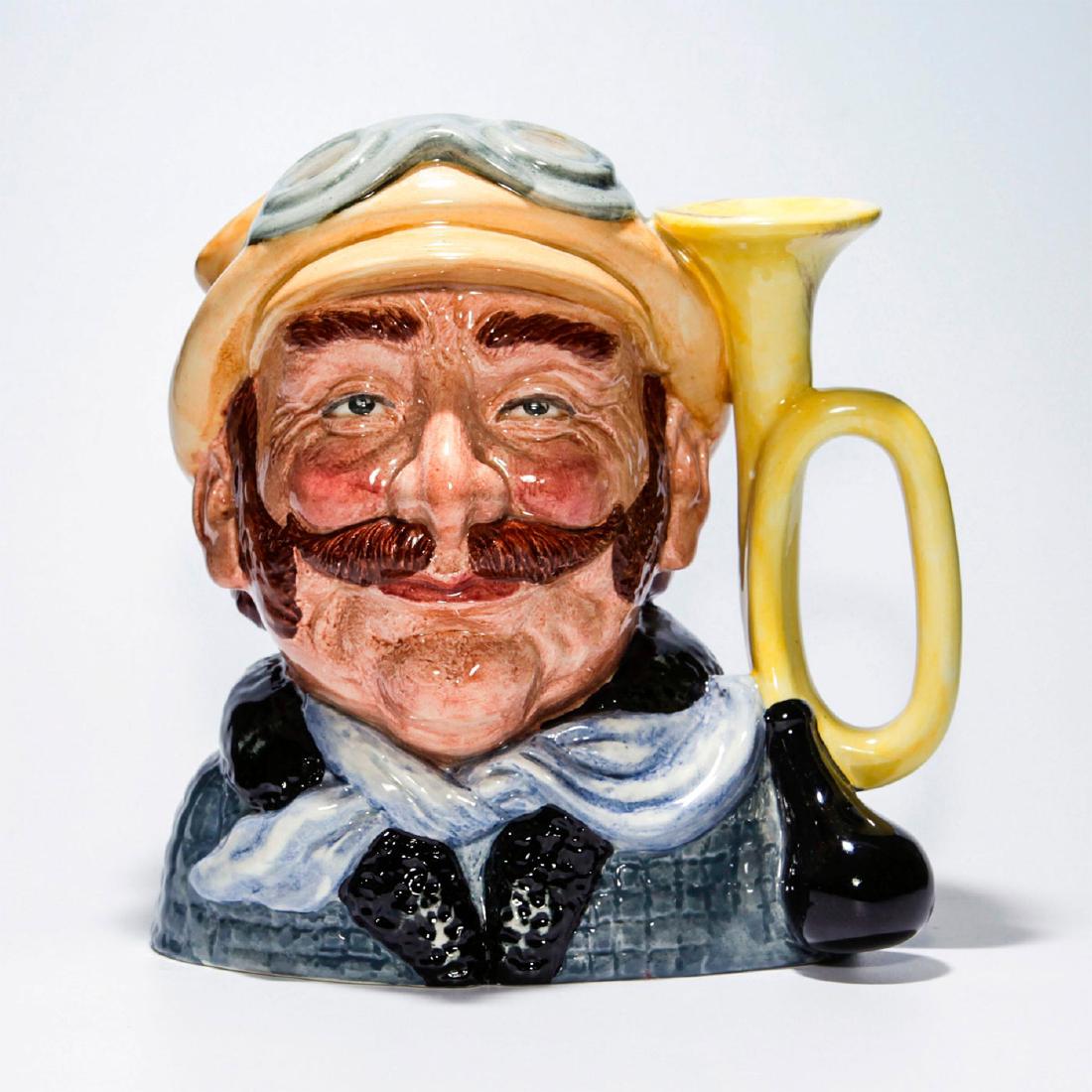 ROYAL DOULTON CHARACTER JUG, VETERAN MOTORIST D6633: Veteran Motorist D6633 Large. Doulton backstamp on bottom. Artist: David B. Biggs Issued: 1973-1983 Dimensions: 7.5"H Manufacturer: Royal Doulton Country of Origin: England