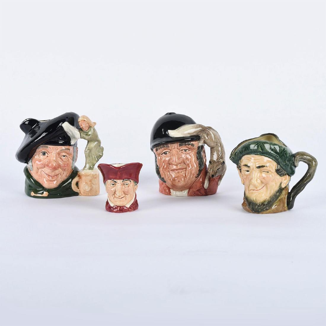 GROUP OF 4 ROYAL DOULTON SMALL CHARACTER JUGS: Includes Tam o' Shanter, The Cardinal, Gone Away and Auld Mac. Three small jugs and a miniature The Cardinal jug. Royal Doulton backstamps. Artist: Various Issued: 20th c. Dimensions: 4.5"H, tallest M