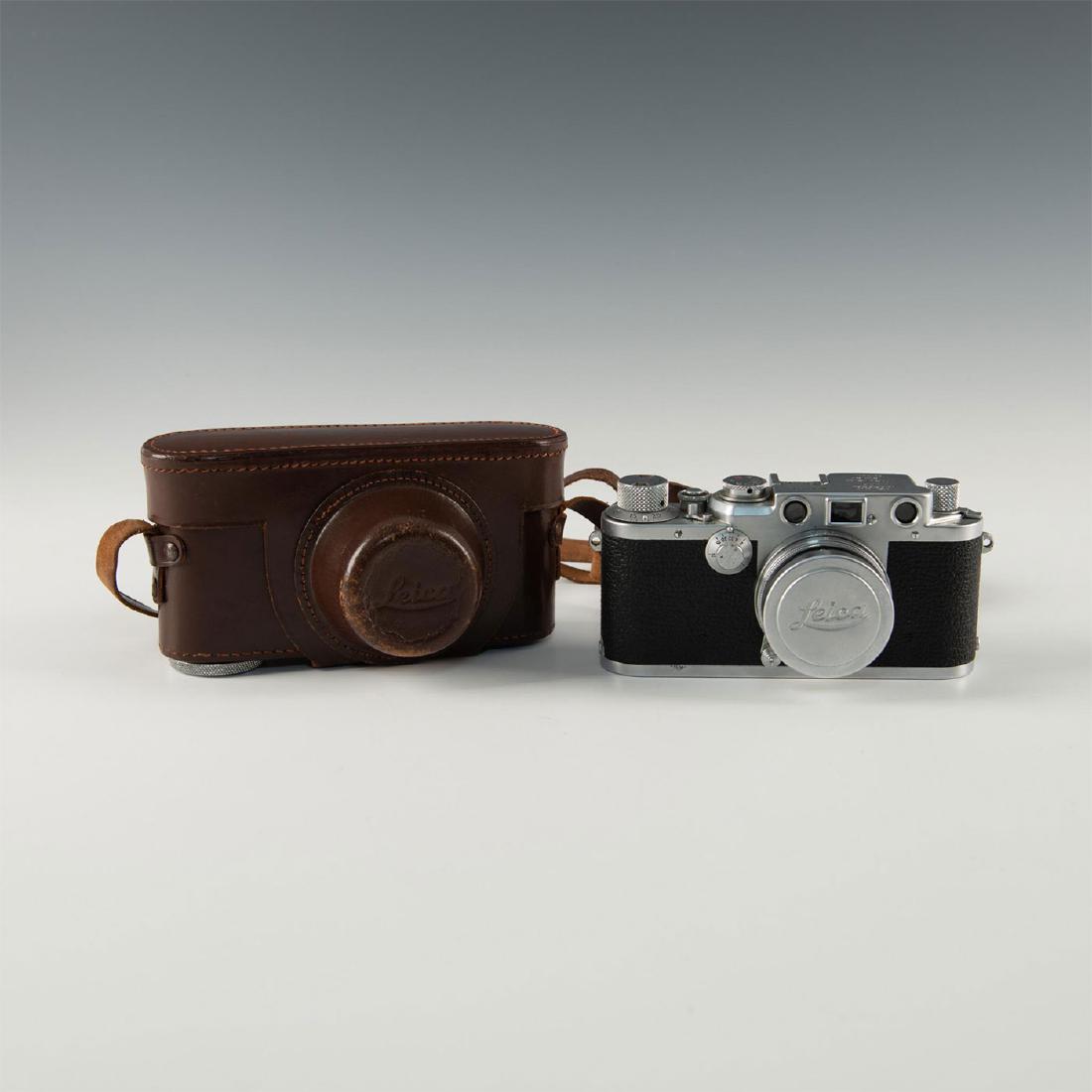 1951 LEICA IIIF RANGEFINDER WITH CASE, SUMMITAR LENS: Camera, Summitar 2 50mm lens, lens cap, case, Serial Nr. 565164.When Ernst Leitz took a chance on his designers radical concept- a compact, high precision camera, shooting 35mm film horizontally- unli