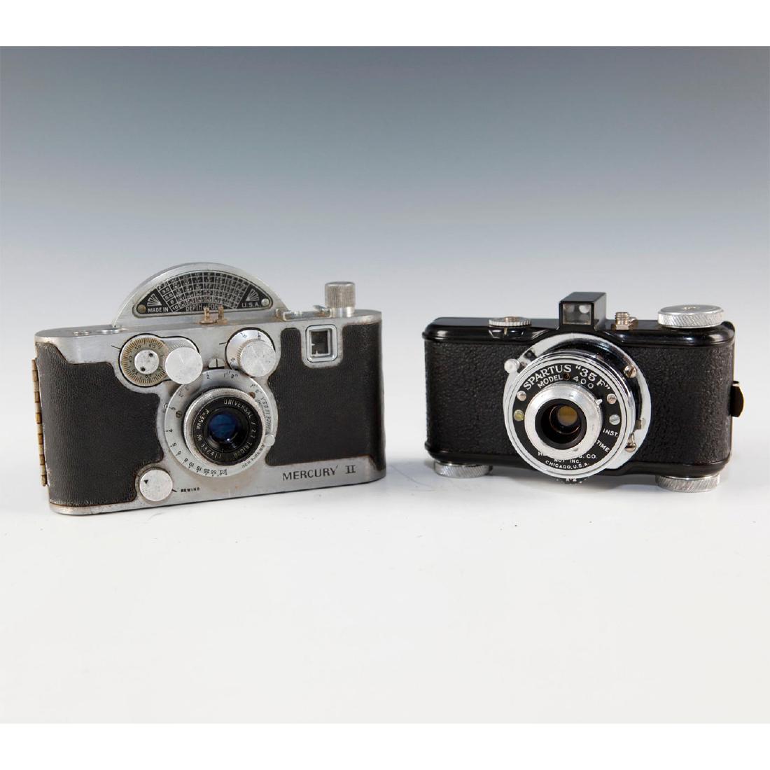PAIR OF RETRO ART DECO AMERICAN STILL CAMERAS: Chrome Merury II w. black accent; black Spartus 35F w. chrome. Issued: 20th c. Dimensions: 5.5"L X 1.5"D X 3.75"H largest Manufacturer: Various Country of Origin: United States