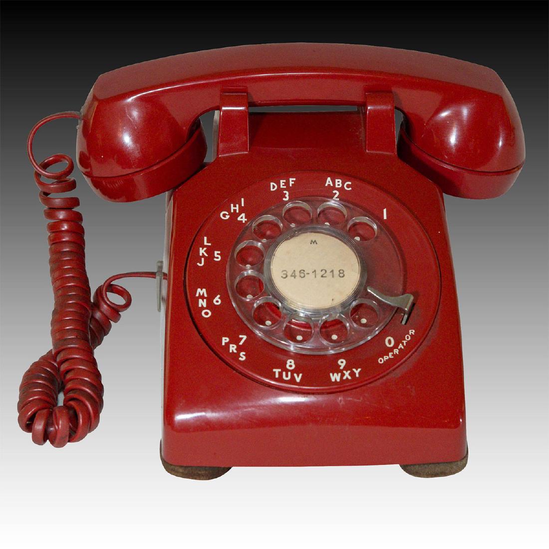 WESTERN ELECTRIC TYPE 500 RED DESK SET TELEPHONE: Red, featuring smooth rounded aerodynamic style of post-war Bell. An original Western Electric Type 500 desk set telephone in fire engine red, manufactured ca. 1954 and featuring the smooth, rounded a