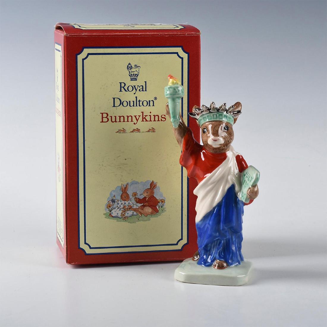 ROYAL DOULTON BUNNYKINS FIGURINE STATUE OF LIBERTY: DB198. Special edition of 3,000 figurines. Stamped to base ROYAL DOULTON and other marks. Original collectors box. Artist: C. Dadd Issued: 1999; S.E. 3,000 Dimensions: 5"H Edition Number: 312 Edition