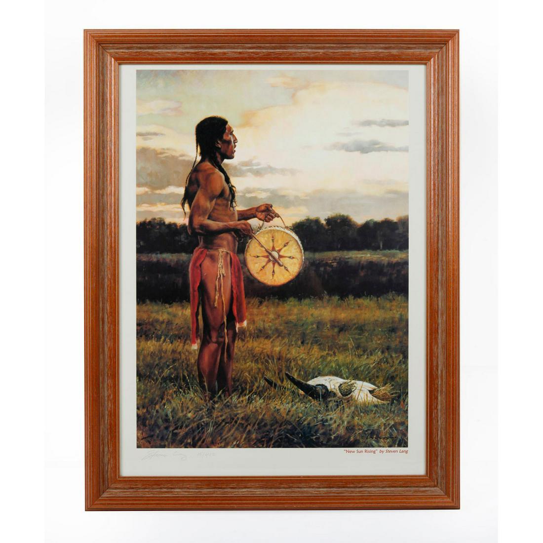 STEVEN LANG NEW SUN RISING NATIVE AMERICAN PRINT: Wooden framed poster of a Native American Indian playing drum. Limited edition piece numbered 15/400. Signed by artist on the lower right corner of the print. 23"H x 17"W, pictured. Artist: Steven Lan