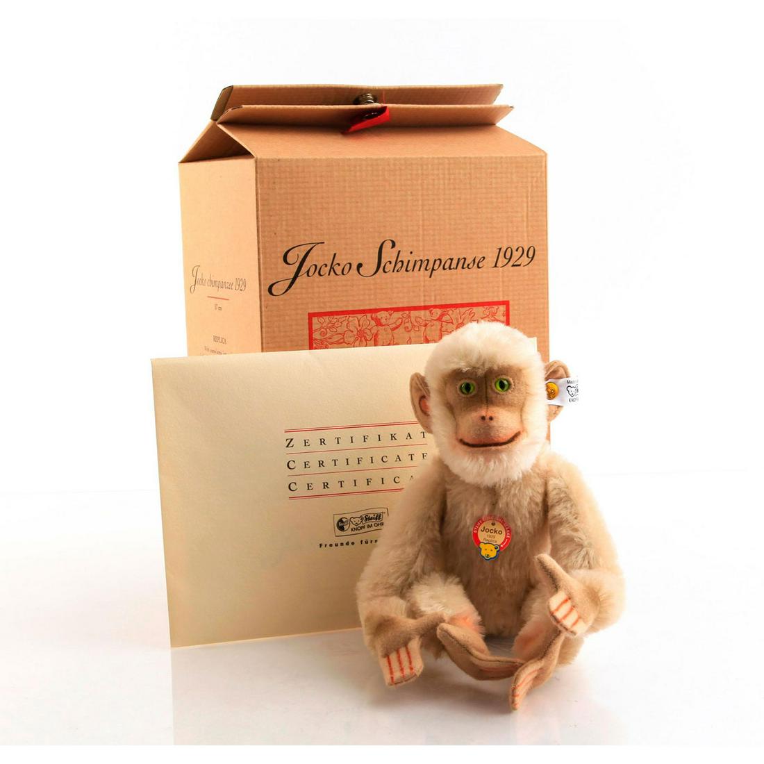 STEIFF REPLICA 1929, JOCKO SCHIMPANSE 401206, 2004: Limited edition of 1500. Ear button and tag intact; chest tag. Articulated model; green glass eyes. Stuffed with wood shavings. Complete with original box and certificate. Jocko measures, 11"H. Issued