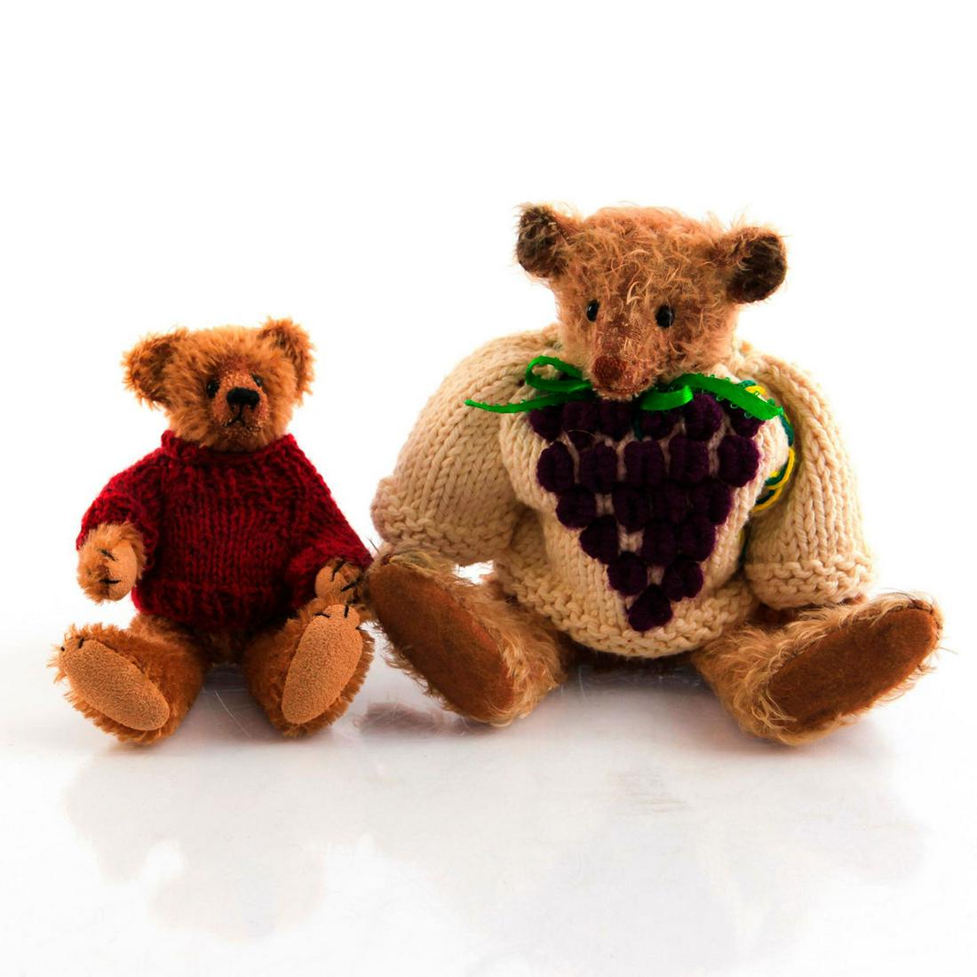SET OF 2 ARTICULATED MOHAIR TEDDY BEARS: Both dressed in knitted sweaters. One has maker's tag. Issued: 20th c. Dimensions: 8.75"H, tallest