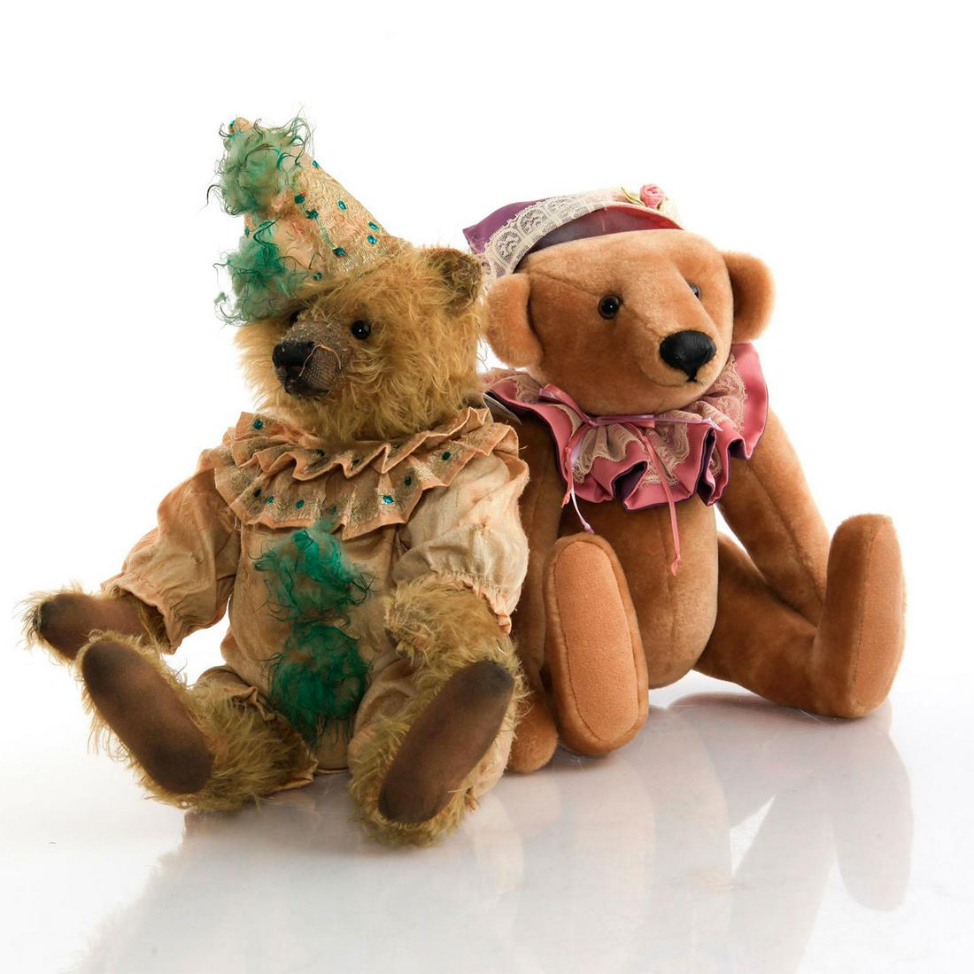 1 NORBEARY ARTICULATED BEAR, 1 PLUSH BEAR ARTICULATED: Both dressed as jesters. Norbeary has tag around neck, mohair. Issued: 20th c. Dimensions: 12"H, tallest Manufacturer: Norbeary Bears Country of Origin: England