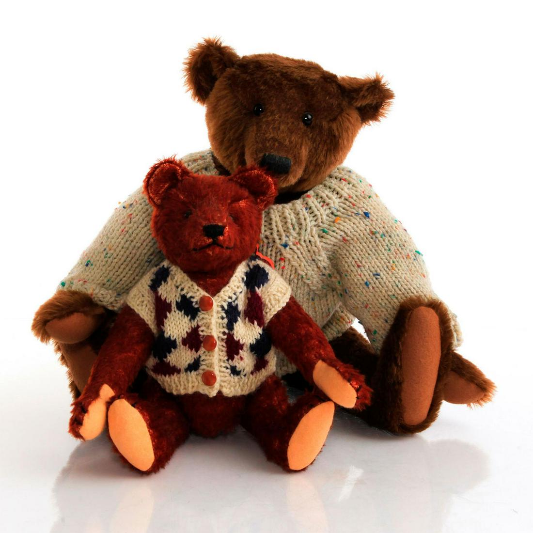 DUO OF VINTAGE TEDDY BEARS: Both are distressed, no tags. Legs and arms jointed. Comes with sweaters. Suede paws. Issued: 20th c. Dimensions: 17.5"H, tallest Country of Origin: United States