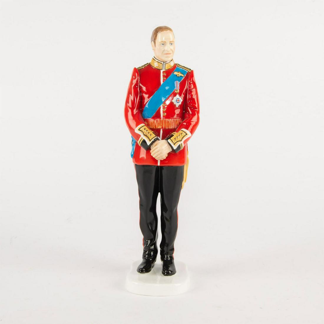 ROYAL DOULTON FIGURINE, PRINCE WILLIAM HN5573: To celebrate the ROYAL WEDDING DAY of William and Catherine. Handpainted tunic of the Irish Guards in red, black and accented in gold gilt. Royal Doulton backstamp. Artist: Timothy Potts Issued: 2012 