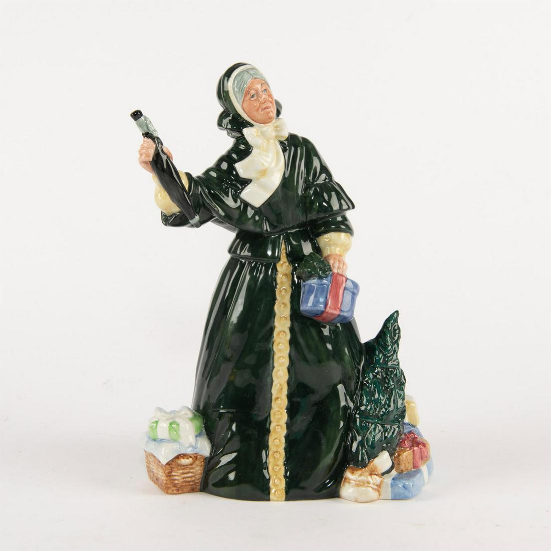 ROYAL DOULTON FIGURINE, CHRISTMAS PARCELS HN2851: Handpainted. Royal Doulton backstamp. Artist: William K. Harper Issued: 1978 - 1982 Dimensions: 9.75"H Manufacturer: Royal Doulton Country of Origin: England