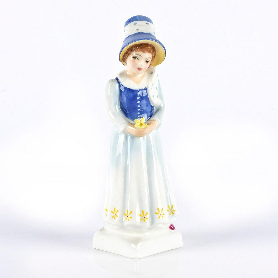 ROYAL DOULTON FIGURINE, LUCY HN2863: Young girl in blue and white dress holding a flower. Title of figure and Royal Doulton backstamp on bottom. Artist: Peggy Davies Issued: 1980-1984 Dimensions: 6"H Manufacturer: Royal Doulton Country o