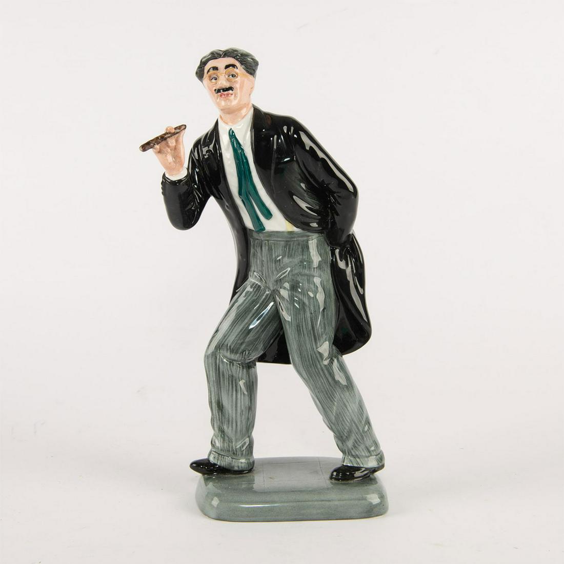 ROYAL DOULTON FIGURINE, GROUCHO MARX HN2777: Handpainted, part of the Entertainers Series. Royal Doulton backstamp. Artist: William K. Harper Issued: 1991 Dimensions: 9.5"H Edition Number: 996 Edition Size: 9500 Manufacturer: Royal Doulton Count