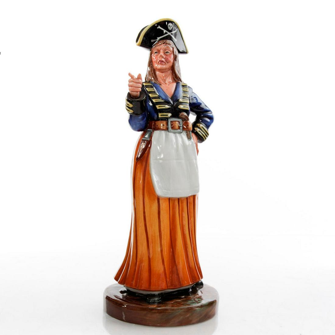 ROYAL DOULTON FIGURINE, RUTH, THE PIRATE MAID HN2900: Gilbert and Sullivan series. Brown and blue colorway. Doulton backstamp. Artist: William K. Harper Issued: 1981-1985 Dimensions: 11.5"H Manufacturer: Royal Doulton Country of Origin: England