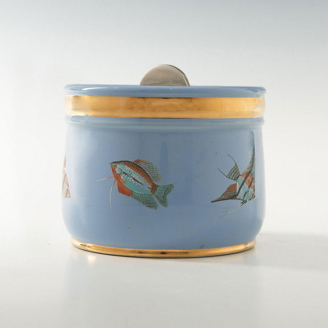 ROYAL DOULTON CERAMIC HUMIDOR: 20th c. fish themed humidor. This ceramic humidor features a spring sealed top and tropical fish design, along with two gold rims. The bottom has the Royal Doulton backstamp. Issued: 20th c. Dimension