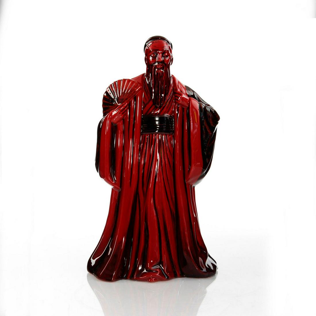 ROYAL DOULTON FLAMBE FIGURINE, CONFUCIUS HN3314: Chinese philosopher in robe with fan.Â Royal Doulton backstamp on bottom.Â Artist: Peter Gee Issued: 1990-1995 Dimensions: 9"H Manufacturer: Royal Doulton Country of Origin: England